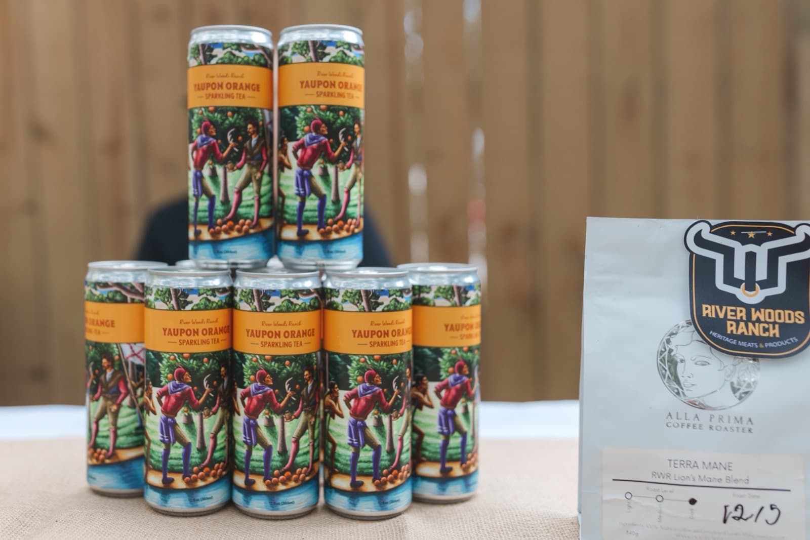 Cans of Yaupon Orange sparkling tea on display at The Farm