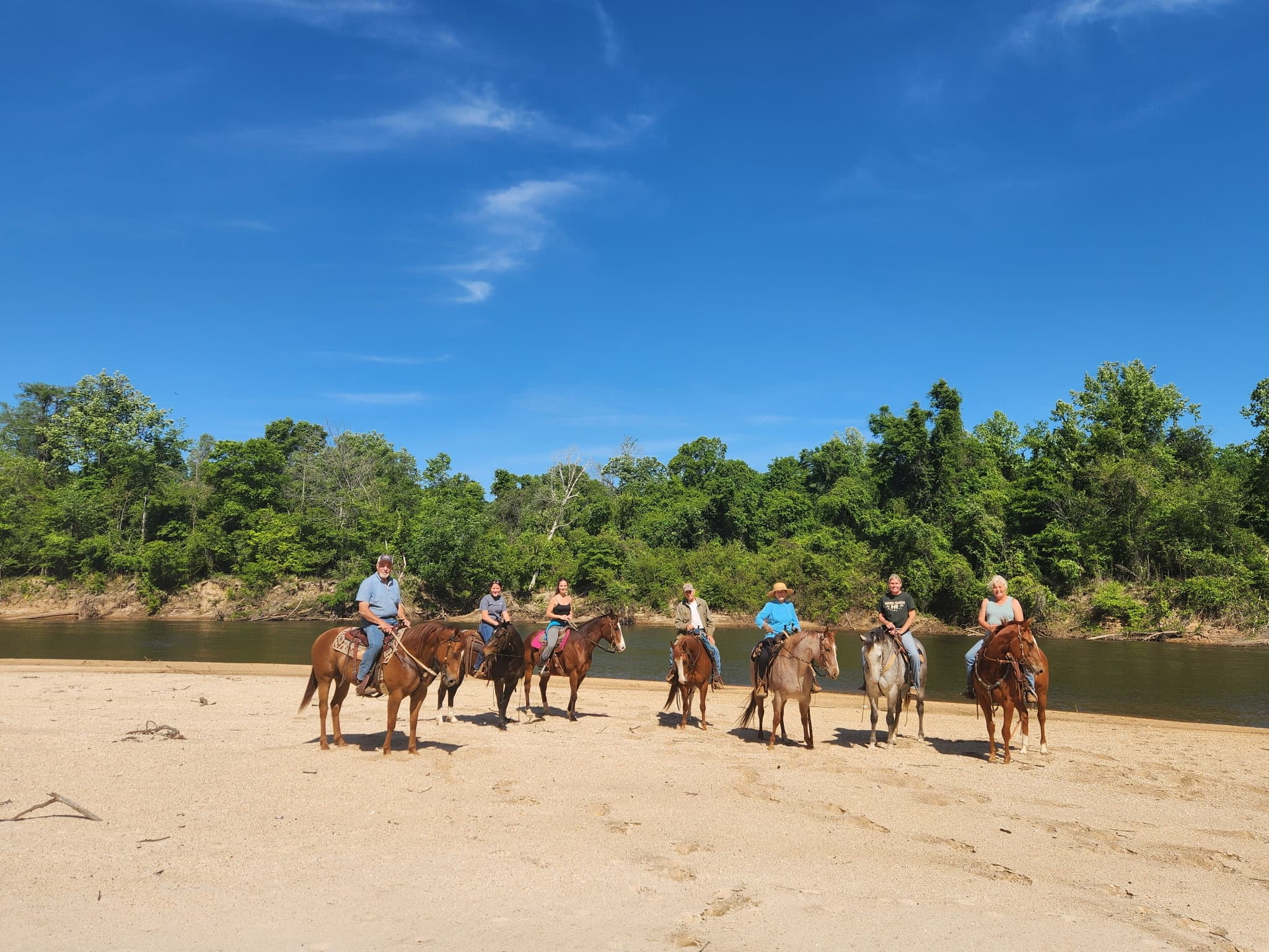 A trail ride along the sandbar at River Woods Ranch