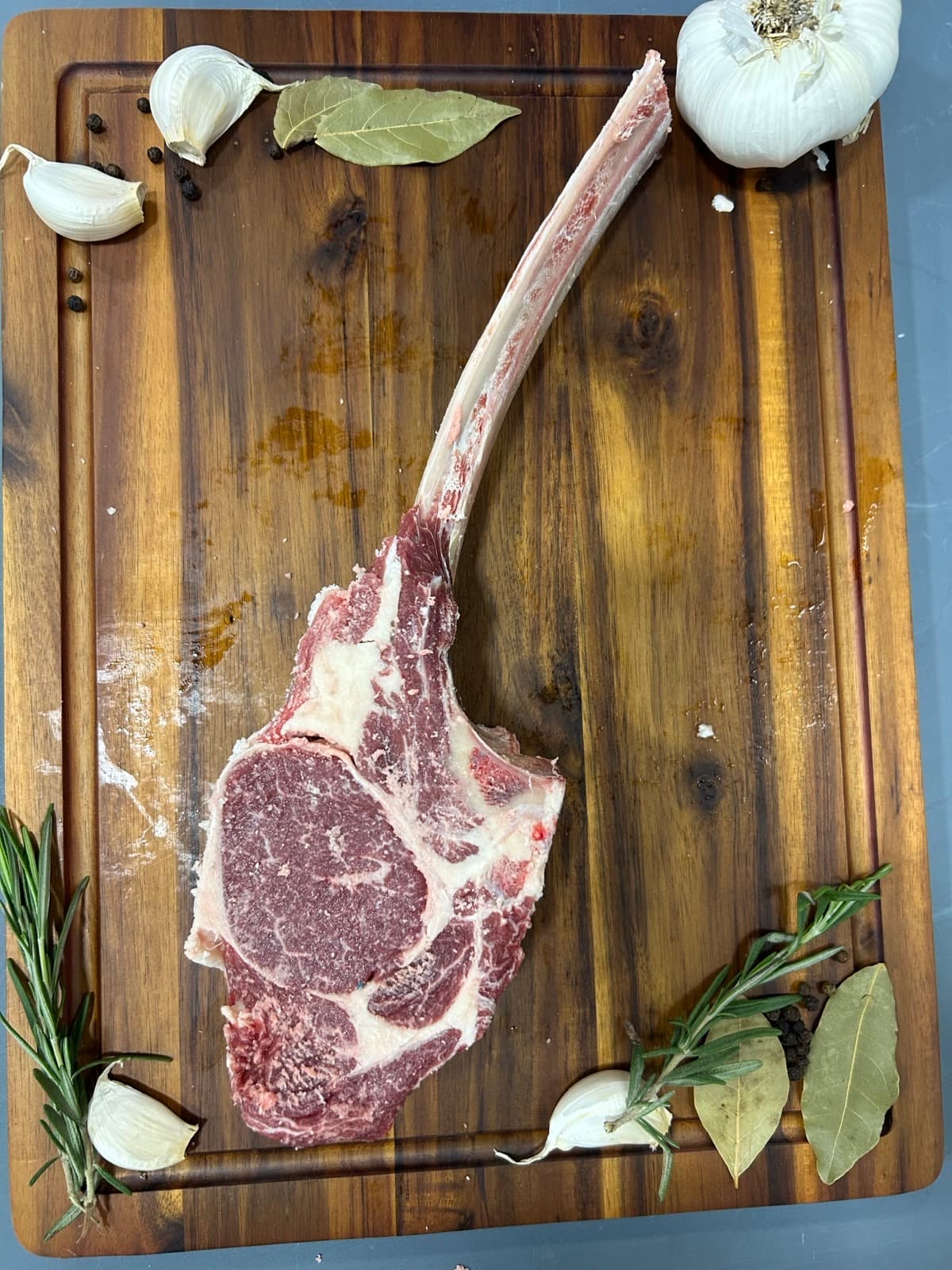 A raw tomahawk ribeye from the ranch's Florida Cracker herd